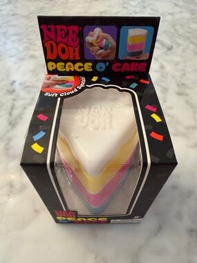 NWT Viral Nee Doh Peace O' Cake Soft Cloud Squish Toy - White/Pink/Yellow/Blue